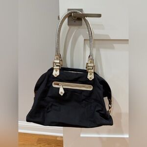 Black Satchel Handbag With Golden Metallic Leather Handles
